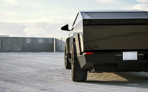 Pure Platinum Wrapped Tesla Cybertruck - UP CYBRHEX Wheels in Satin Black