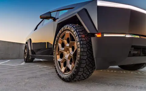 Gloss Black Wrapped Tesla Cybertruck on 24 inch Bronze CYBRHEX Forged Wheels
