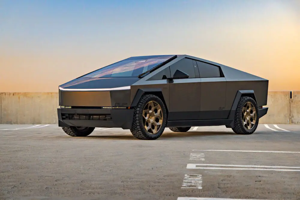 Magnesium Grey Wrapped Tesla Cybertruck on 24 inch CYBRHEX Forged Wheels in Satin Bronze