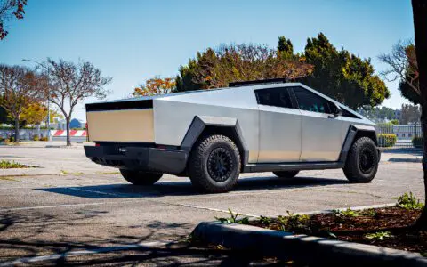 Cybertruck with Front and Rear Invincible Steel Bumpers, UP-03 Beadlock Forged Wheels, and Bedliner Finished Carbon Fiber Parts