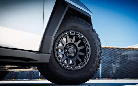 Cybertruck with Front and Rear Invincible Steel Bumpers, UP-03 Beadlock Forged Wheels, and Bedliner Finished Carbon Fiber Parts