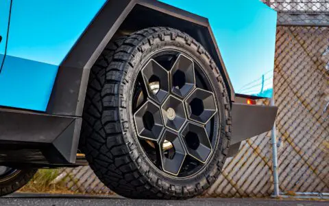 Gloss Sky Blue Wrapped Tesla Cybertruck on 24 inch CYBRHEX wheels in Satin Black