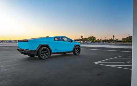 Gloss Sky Blue Wrapped Tesla Cybertruck on 24 inch CYBRHEX wheels in Satin Black