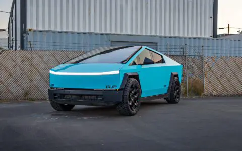 Gloss Sky Blue Wrapped Tesla Cybertruck on 24 inch CYBRHEX wheels in Satin Black