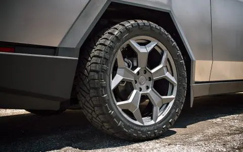 Stainless Steel Tesla Cybertruck on 24-Inch UP Forged CYBRSPOKE in Satin Titanium
