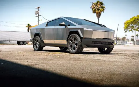 Stainless Steel Tesla Cybertruck on 24-Inch UP Forged CYBRSPOKE in Satin Titanium