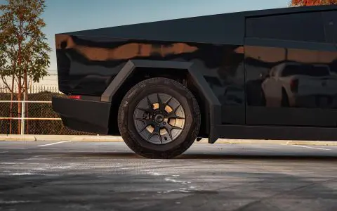 Gloss Black Tesla Cybertruck on 20-Inch UP Forged UP-RW Wheels in Satin Black, Satin Gunmetal Ring