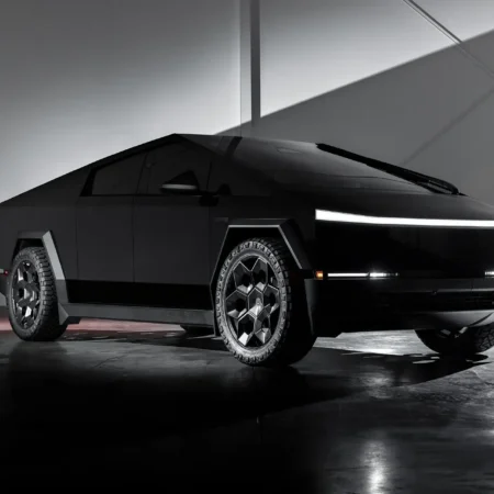 Front view of Tesla Cybertruck with 24-inch CYBRHEX Satin Black Wheels by Unplugged Performance