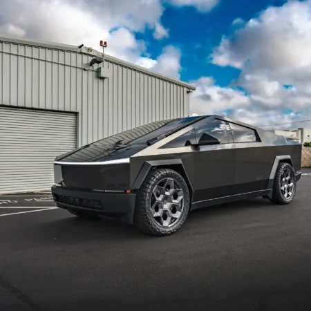 Tesla Cybertruck with Magnesium Grey Wrap and Satin Titanium 24-inch CYBRHEX Forged Wheels – Side profile