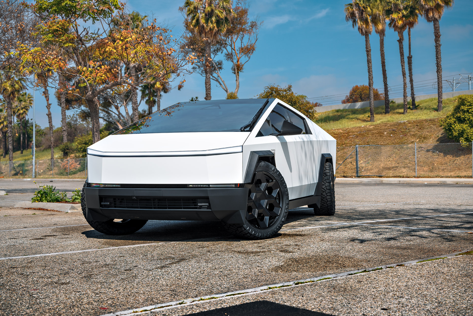 White Wrapped Tesla Cybertruck Foundation Series on 24 inch CYBRHEX Forged Wheels in Gloss Black